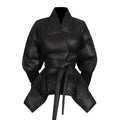 Stylish women's black winter coat with belt featuring a puffy design for warmth and comfort