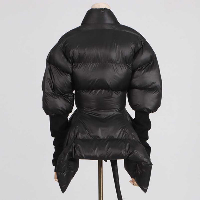 Stylish women's black winter coat with belt featuring a puffy design and unique silhouette