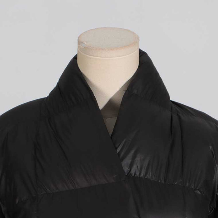 Stylish women's black winter coat with belt featuring a sleek collar design for added warmth